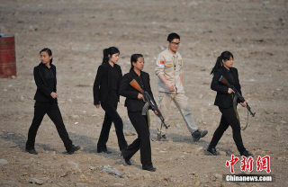 Illustration for article titled China's Personal Bodyguard Training Seems Ridiculously Intense
